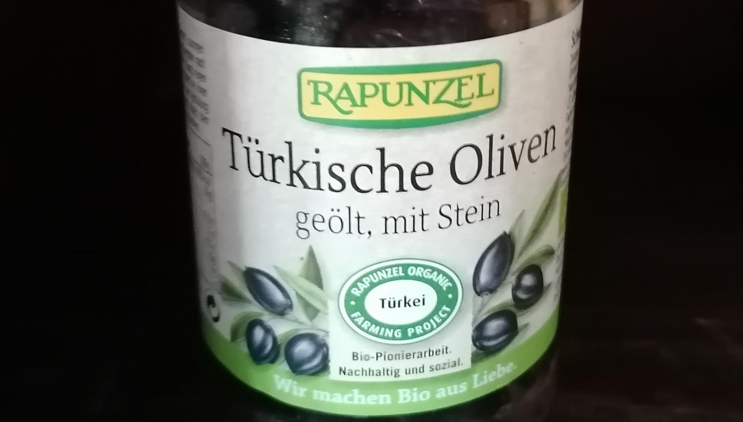 Türkische, schwarze Oliven, geölt mit Stein